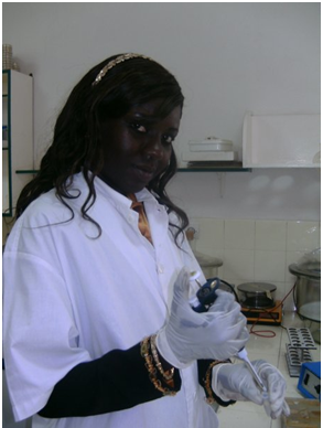 GLOBE Alumna Adjaratou Yacine Daro Dieng prepares to extract DNA from an insect
