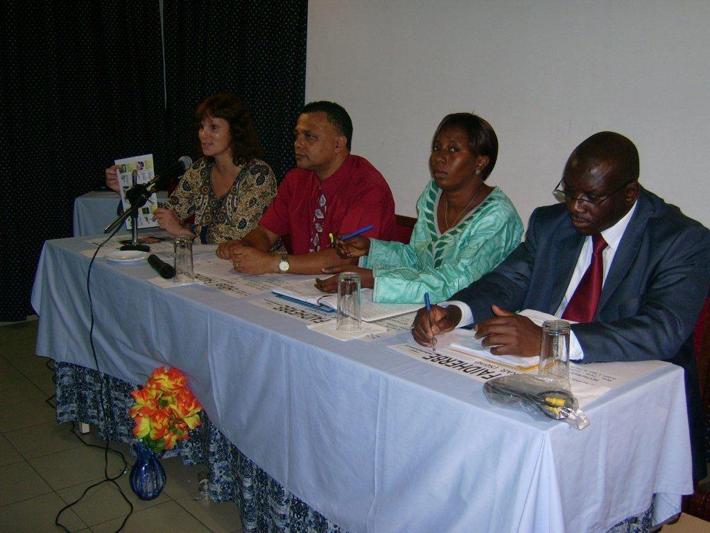 Speakers at a table,