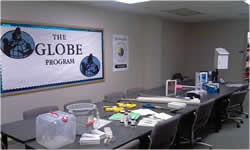 desk with GLOBE logo