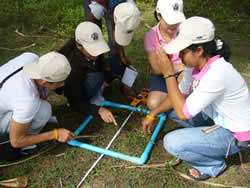 Child doing soil science.