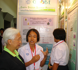 Students with a poster.