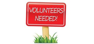 A red volunteers needed sign.