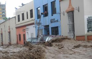 Colorful homes being flooded in Peru.