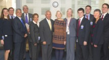A group photo of NASA and Peace Corps administratives