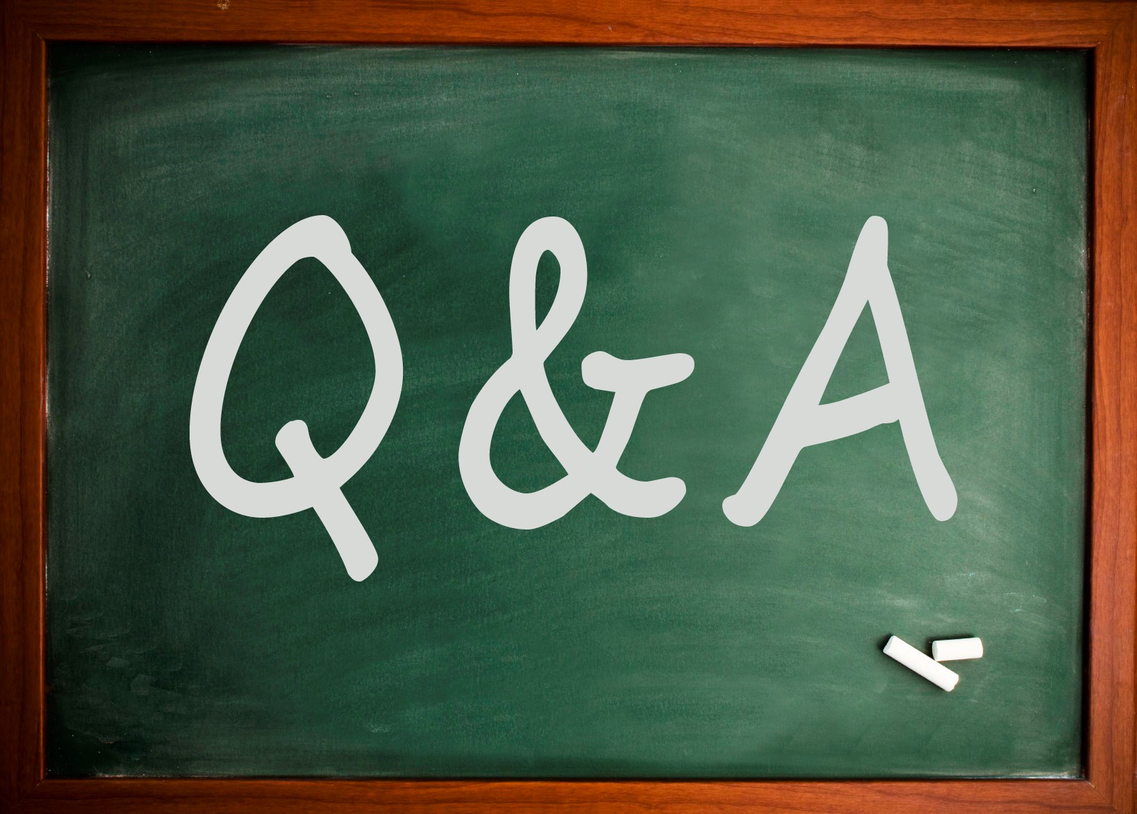 Photo of a chalkboard with "Q&A" written on it.