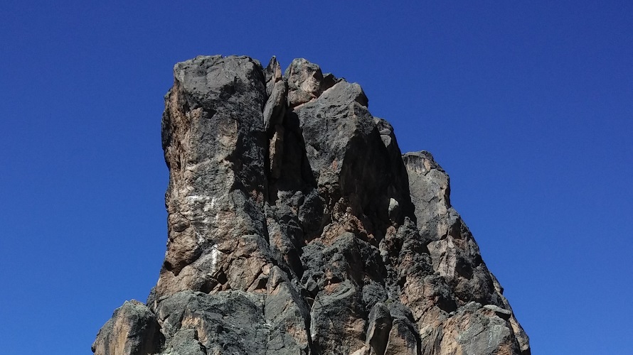 A sharp and steep rock formation.
